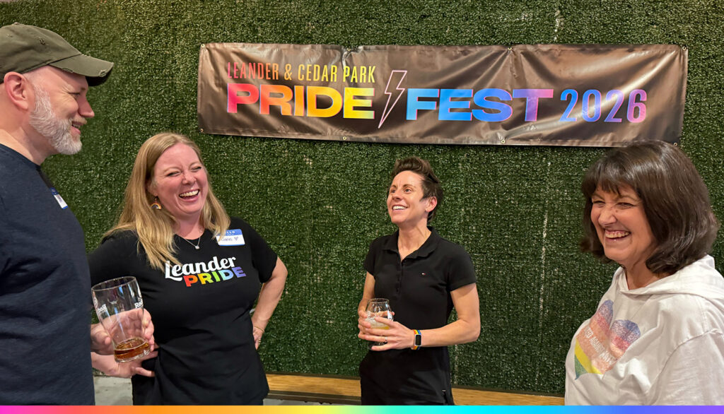 Leander Pride group photo enjoying drinks after Pride Fest